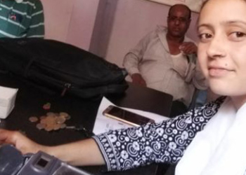 Girls sell urea at Biscomaun surging sale counters