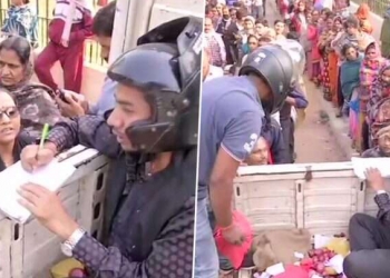 Onion sale: Biscomaun employees wear helmets to protect themselves