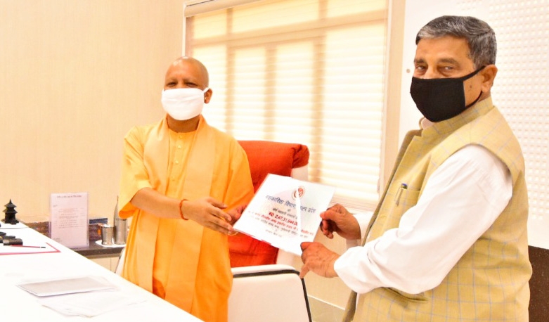 Verma hands over co-op contributions to CM