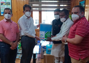Kangra DCCB donates automatic sanitizer machines