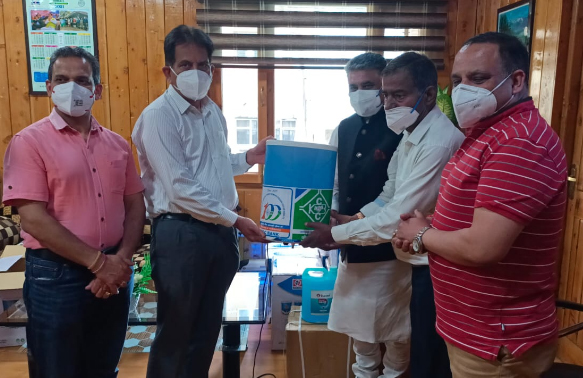 Kangra DCCB donates automatic sanitizer machines