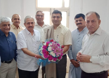 Abhay Kr Singh joins as Cen Registrar; Sah Bharati first to greet him