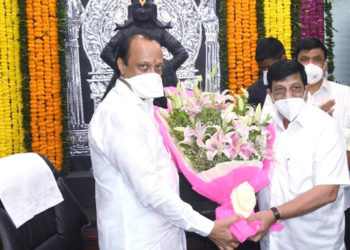 Ajit Pawar greets Anaskar on his elevation