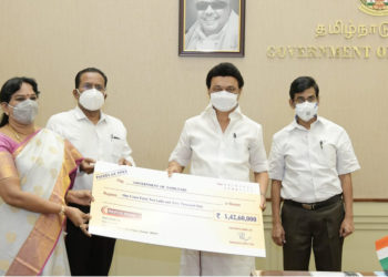 REPCO Bank gives cheque of Rs 1.43 crore to CM
