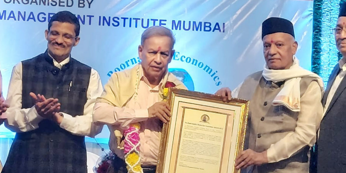 Marathe bags prestigious Economic Award; bats for primacy of co-ops