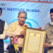 Marathe bags prestigious Economic Award; bats for primacy of co-ops