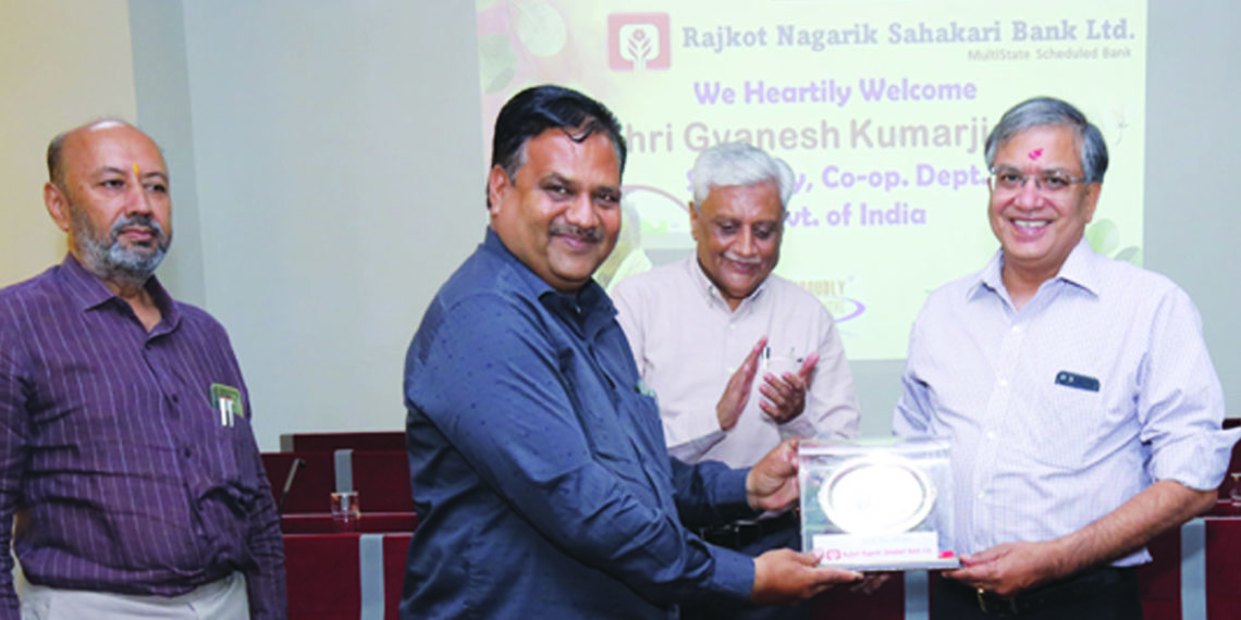 Kumar visits Rajkot Bank; assures to help resolve issues before RBI