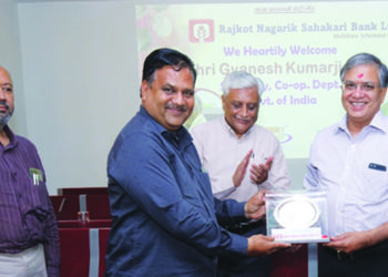 Kumar visits Rajkot Bank; assures to help resolve issues before RBI