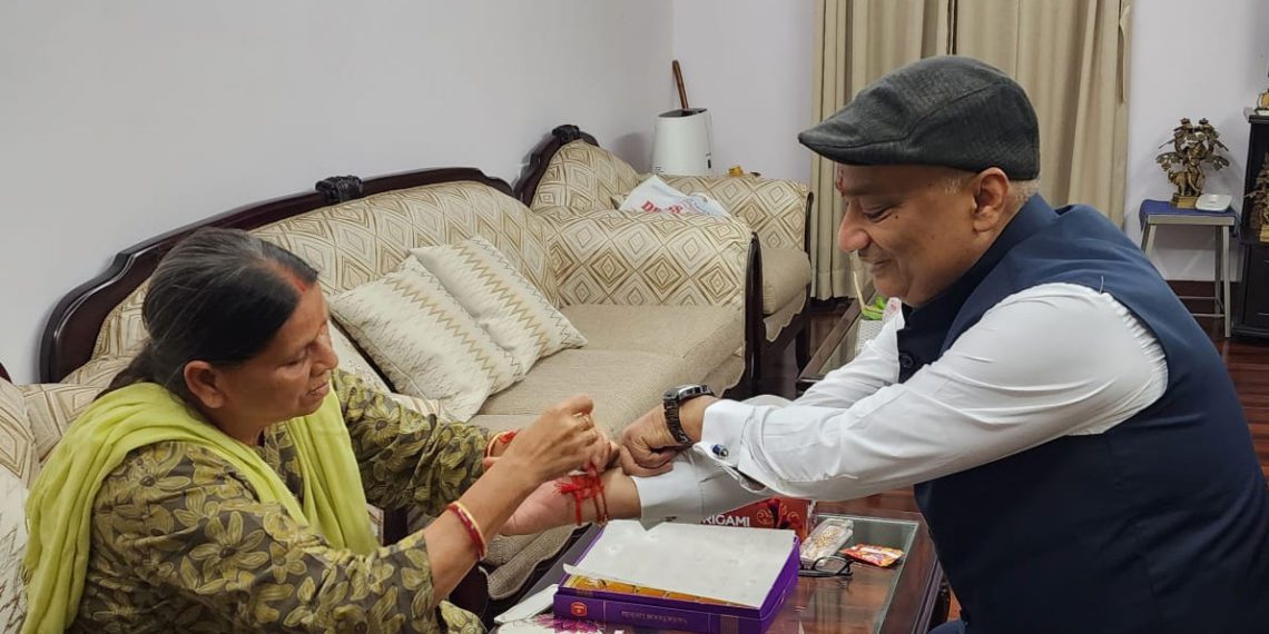 Ex CM ties Rakhi on Biscomaun Chairman