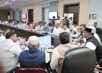 Sarang reviews co-op development with stakeholders at DM office