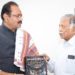 Amin presents book on Gujarat Co-op Law to Minister
