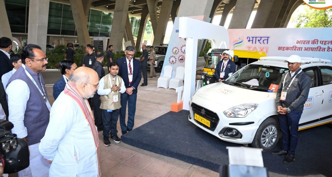 Shah visits Stall of Bharat Taxi in Gandhinagar