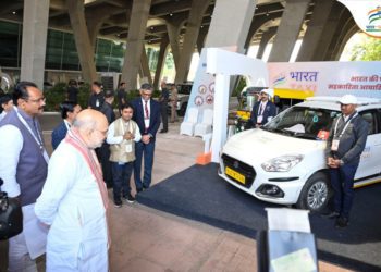 Shah visits Stall of Bharat Taxi in Gandhinagar